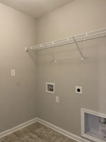 a view of a room with racks on the wall