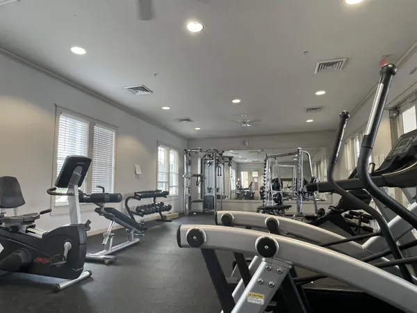 a view of a swimming pool with outdoor seating