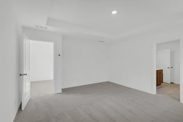 a bathroom with a double vanity sink and mirror