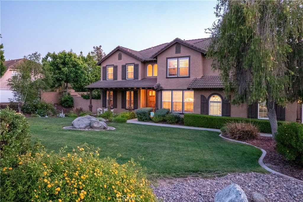 14251 Ashton Lane Riverside, CA 92508 - Photo 1 of 69 a front view of a house with a garden