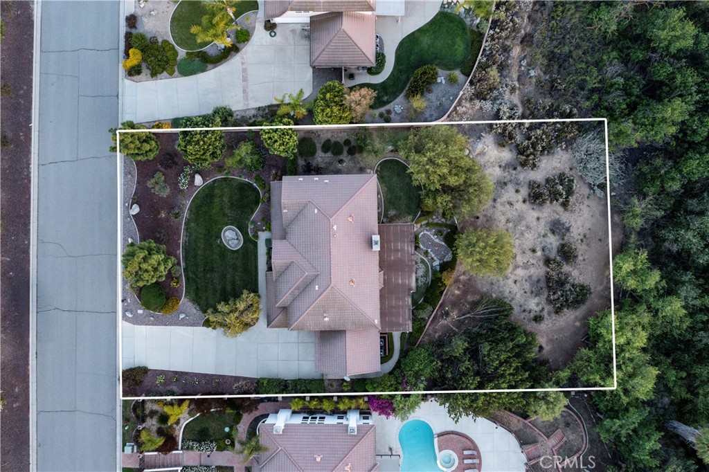 14251 Ashton Lane Riverside, CA 92508 - Photo 66 of 69 an aerial view of a house with a yard