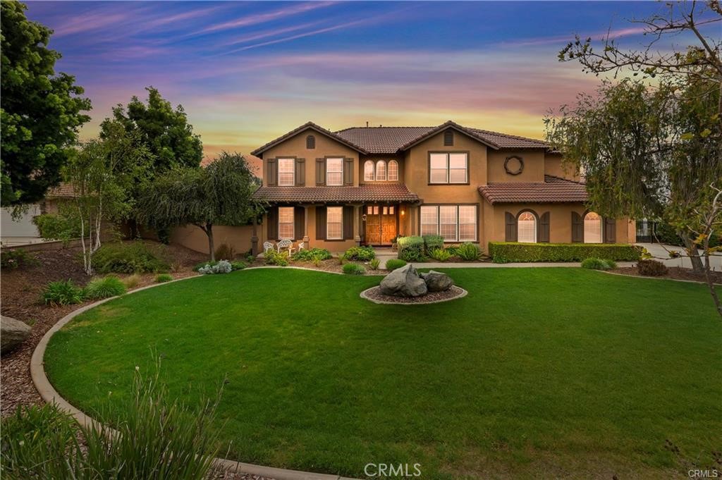14251 Ashton Lane Riverside, CA 92508 - Photo 69 of 69 a front view of a house with garden and porch