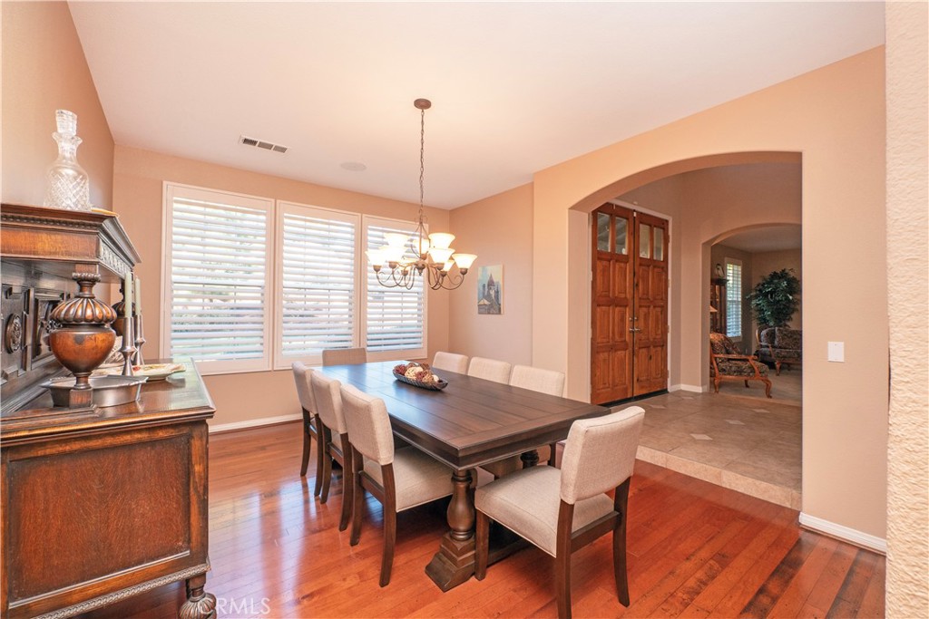 14251 Ashton Lane Riverside, CA 92508 - Photo 10 of 69 a view of a dining room with furniture and window