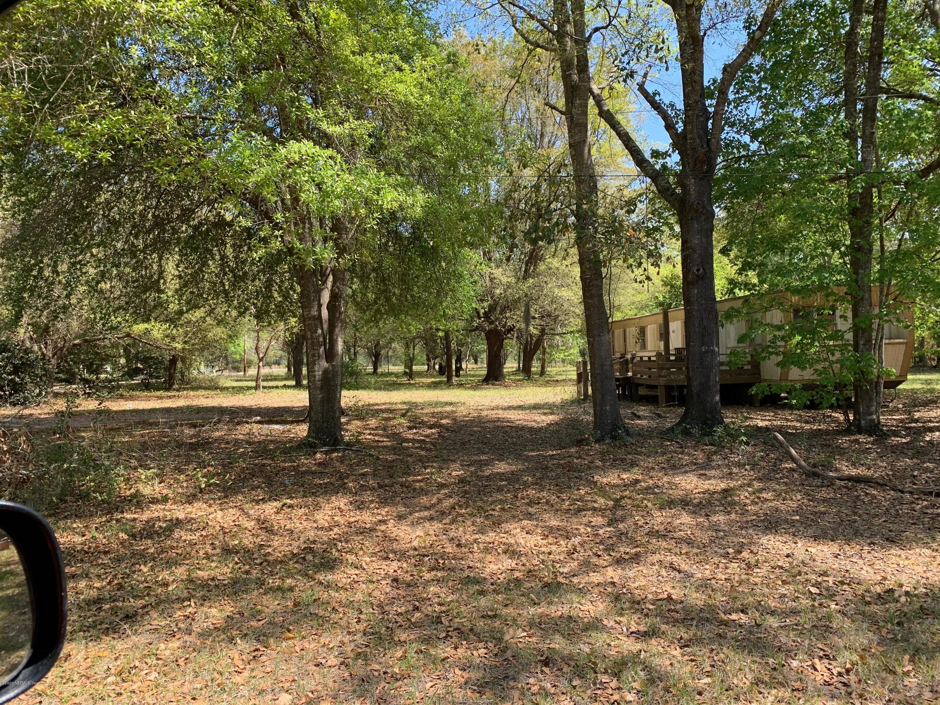 1358 Long Bay Road Middleburg, FL 32068 - Photo 10 of 16 a view of outdoor space with trees