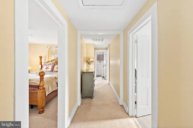 a view of a balcony with wooden floor