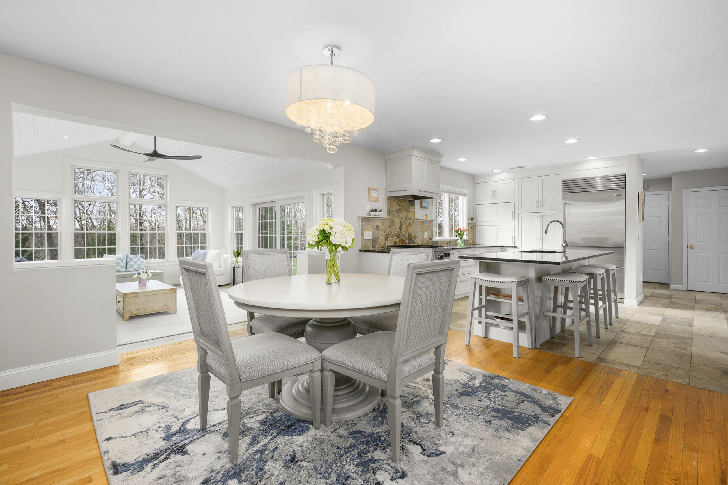 83 Cemetery Road Harwich, MA 02645 - Photo 11 of 53 a view of a dining room with furniture and wooden floor