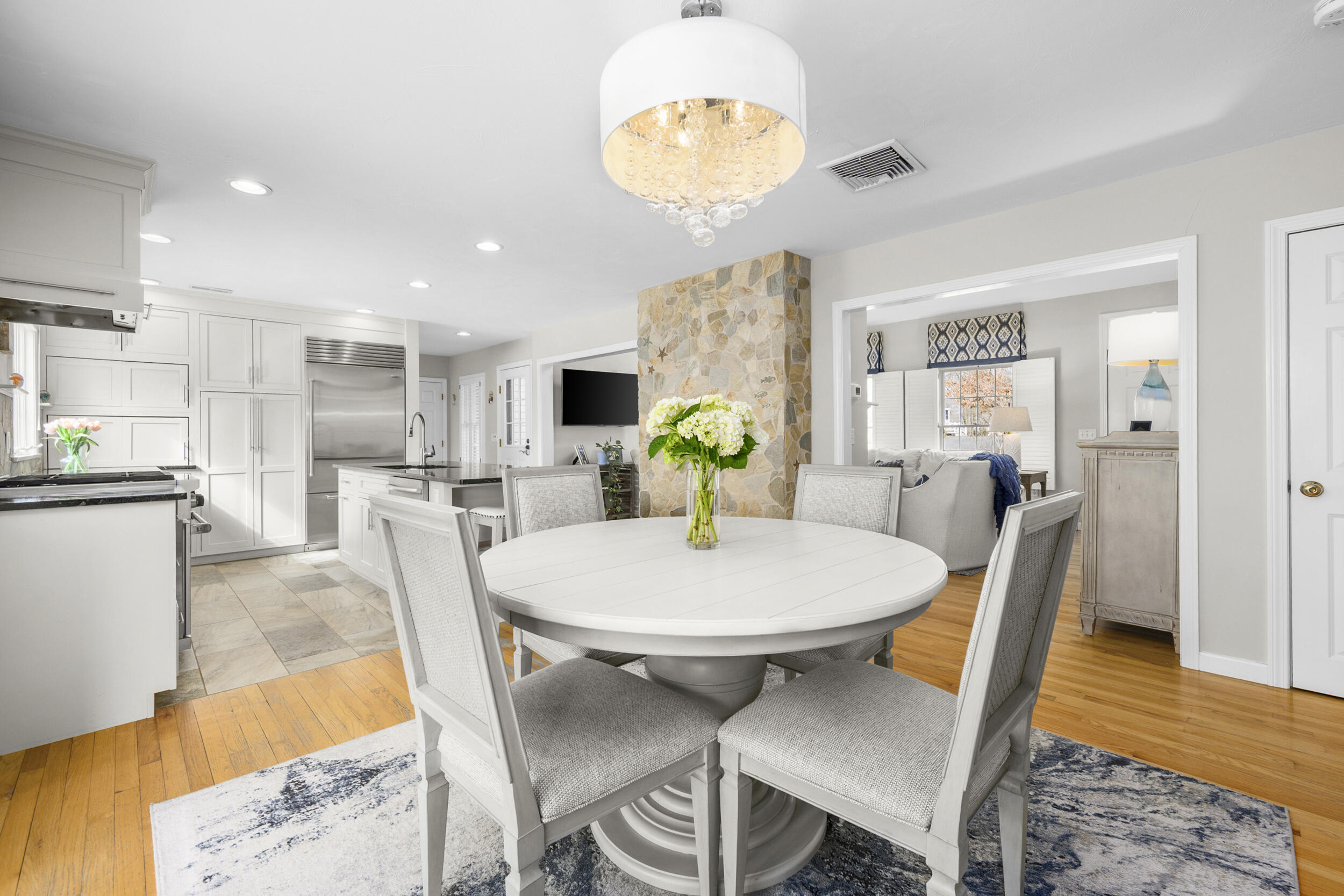 83 Cemetery Road Harwich, MA 02645 - Photo 12 of 53 a view of a dining room with furniture