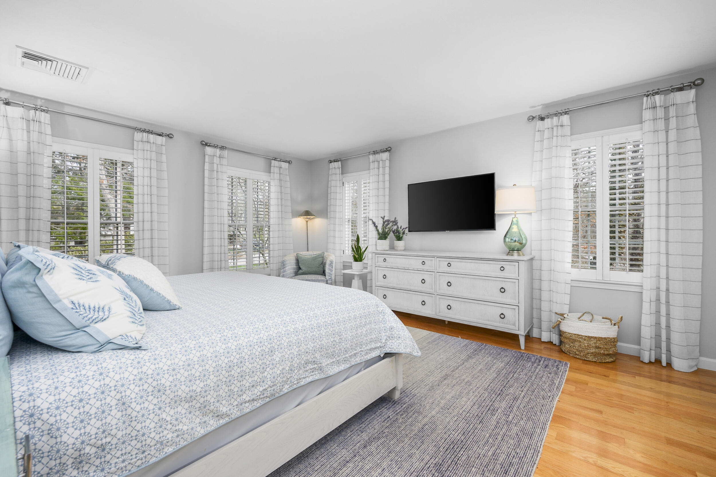 83 Cemetery Road Harwich, MA 02645 - Photo 19 of 53 a bedroom with a bed and a flat screen tv