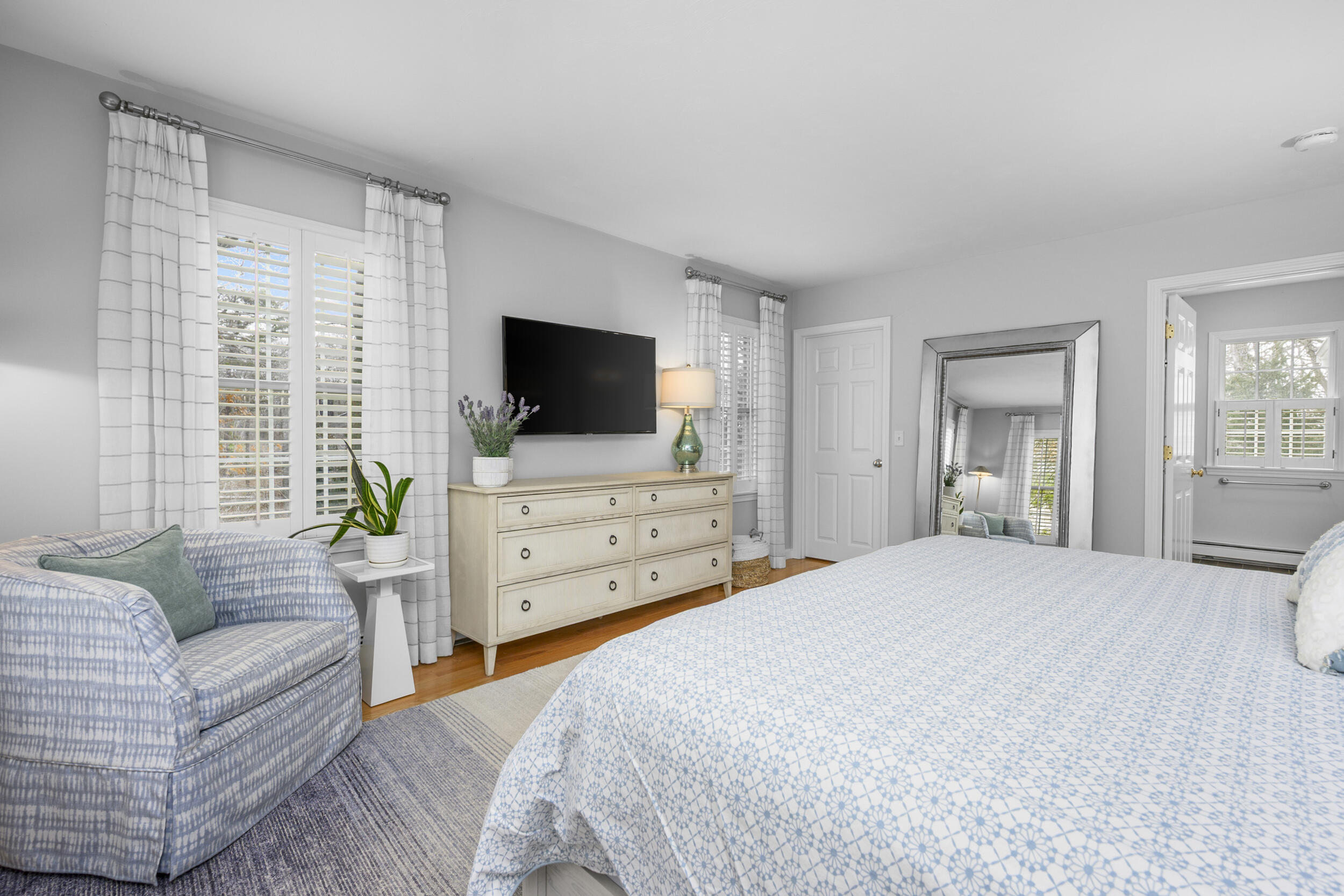 83 Cemetery Road Harwich, MA 02645 - Photo 21 of 53 a bedroom with a bed and a flat screen tv