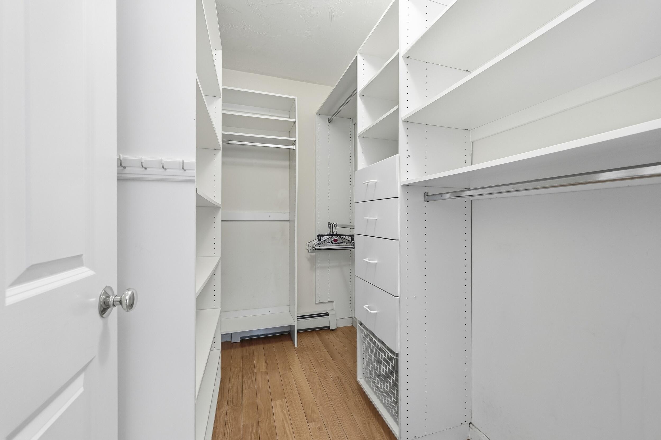 83 Cemetery Road Harwich, MA 02645 - Photo 22 of 53 a view of walk in closet with empty racks