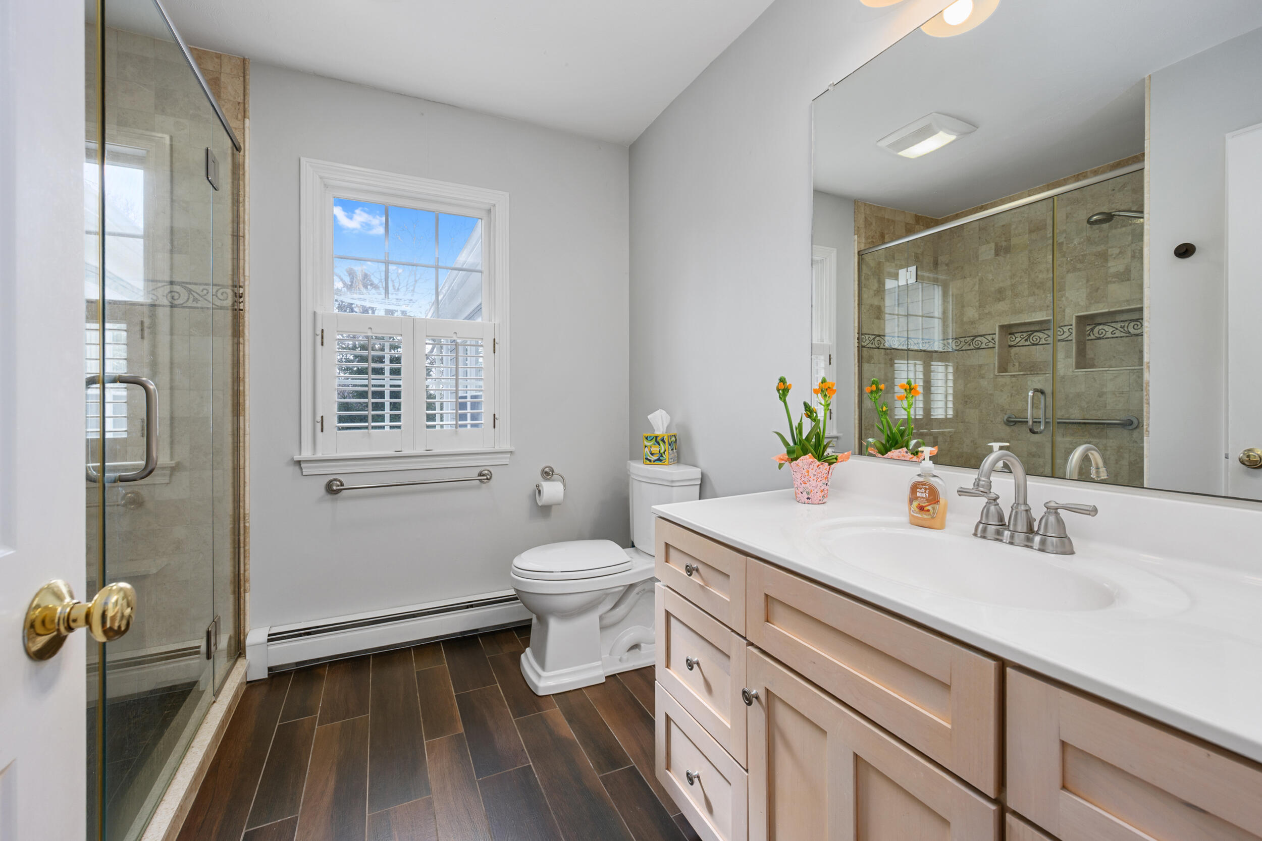 83 Cemetery Road Harwich, MA 02645 - Photo 23 of 53 a bathroom with a sink a toilet and shower