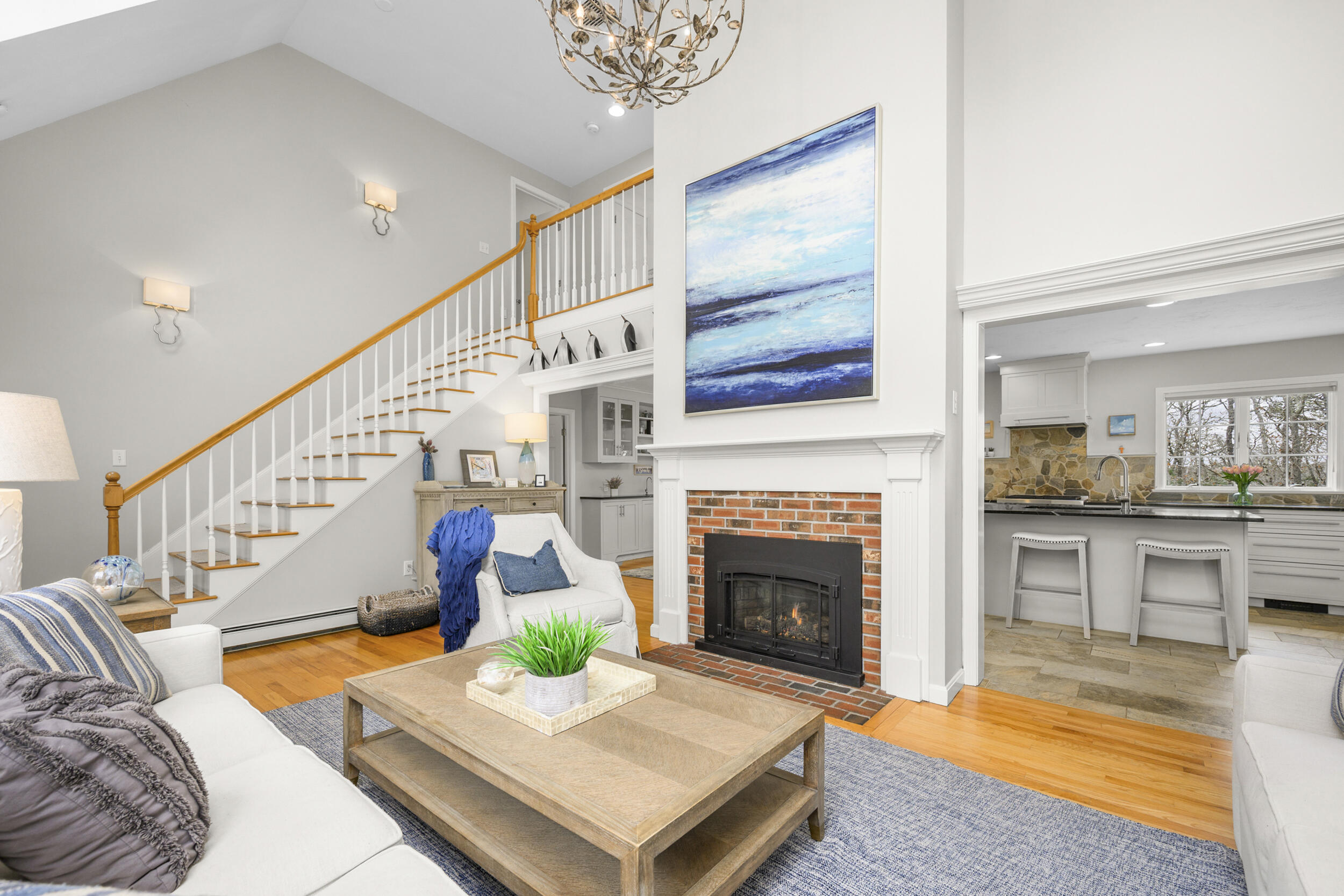 83 Cemetery Road Harwich, MA 02645 - Photo 26 of 53 a living room with furniture fireplace and dining table