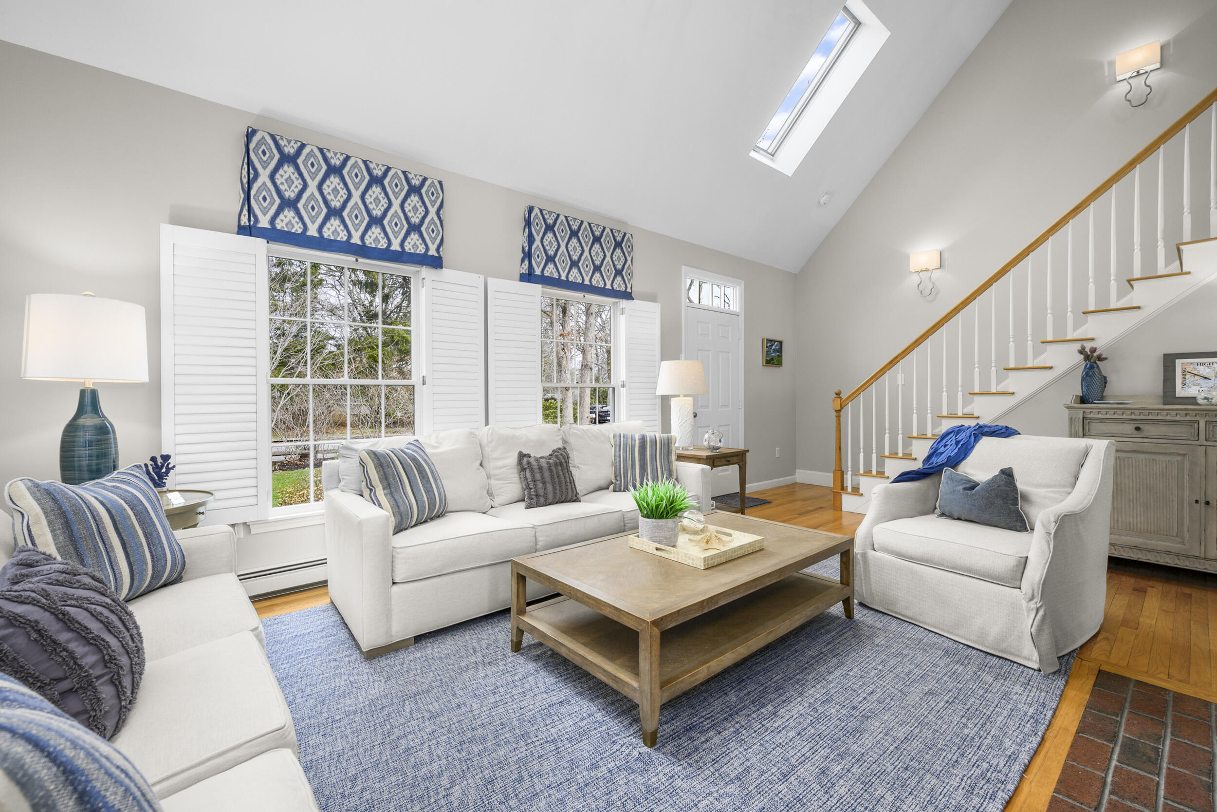 83 Cemetery Road Harwich, MA 02645 - Photo 29 of 53 a living room with furniture large window and a table