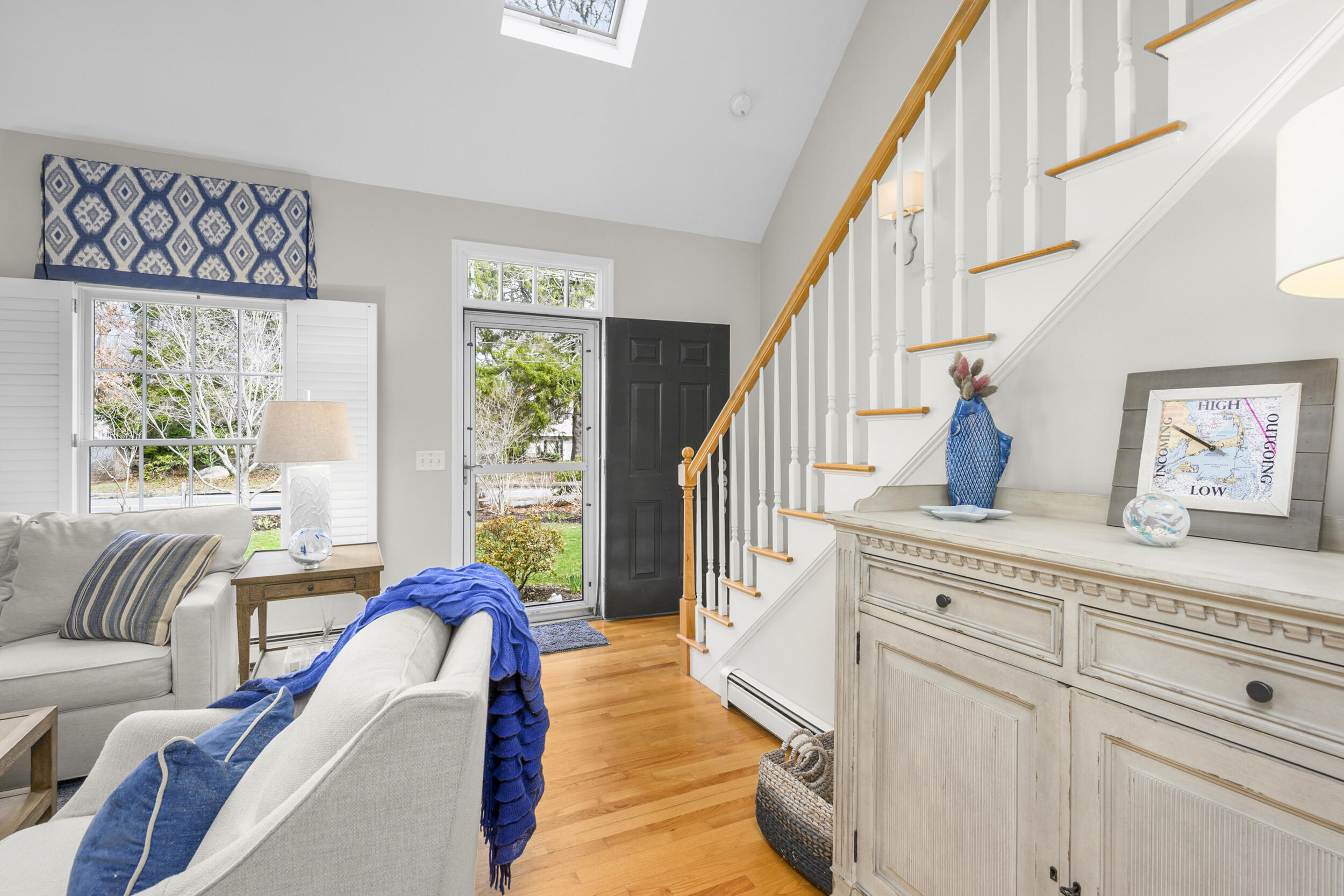 83 Cemetery Road Harwich, MA 02645 - Photo 30 of 53 a living room with furniture and a large window