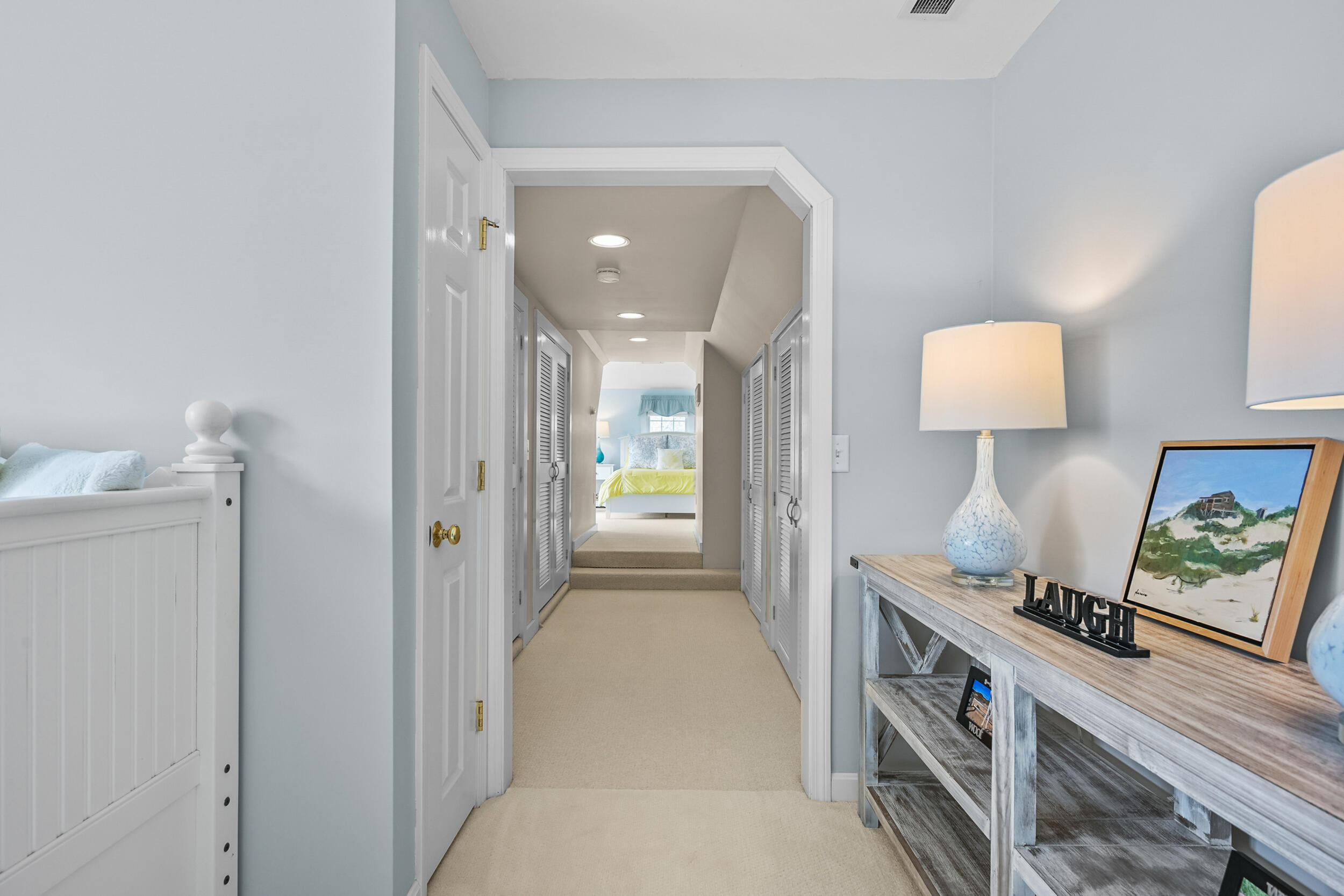 83 Cemetery Road Harwich, MA 02645 - Photo 38 of 53 a view of hallway with furniture and a lamp