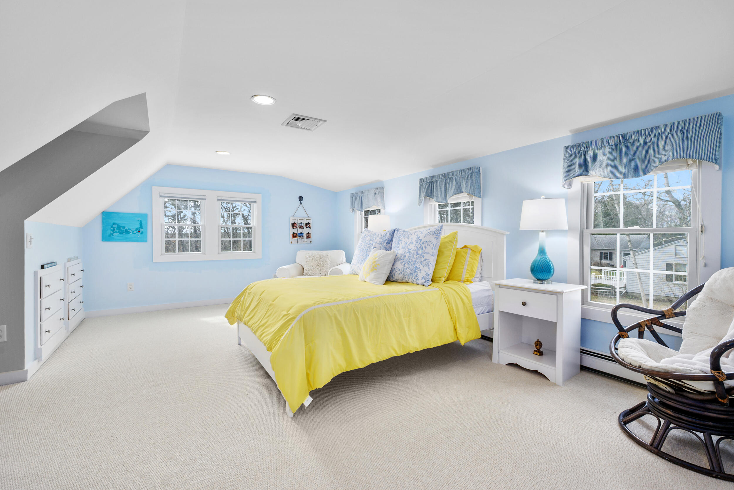 83 Cemetery Road Harwich, MA 02645 - Photo 41 of 53 a bed room with a bed and a lamp