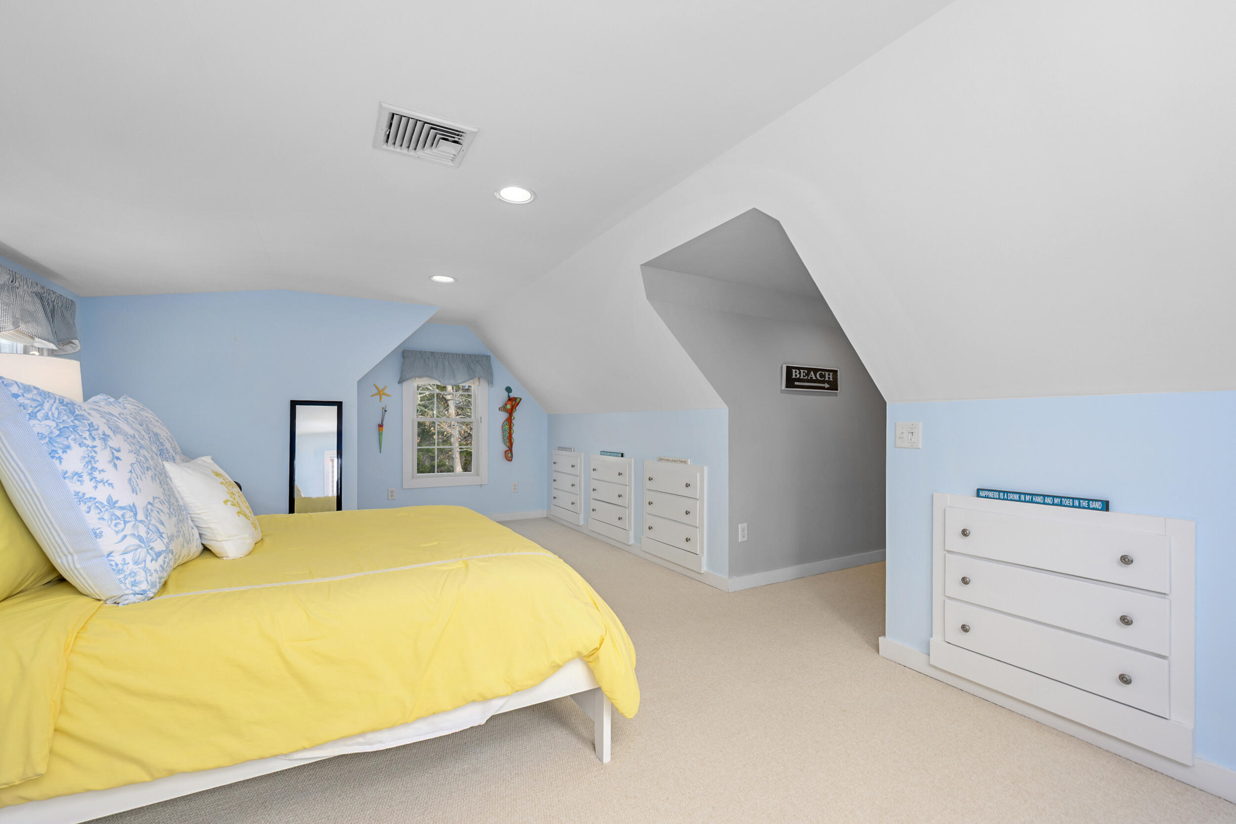 83 Cemetery Road Harwich, MA 02645 - Photo 42 of 53 a spacious bedroom with a bed and dresser