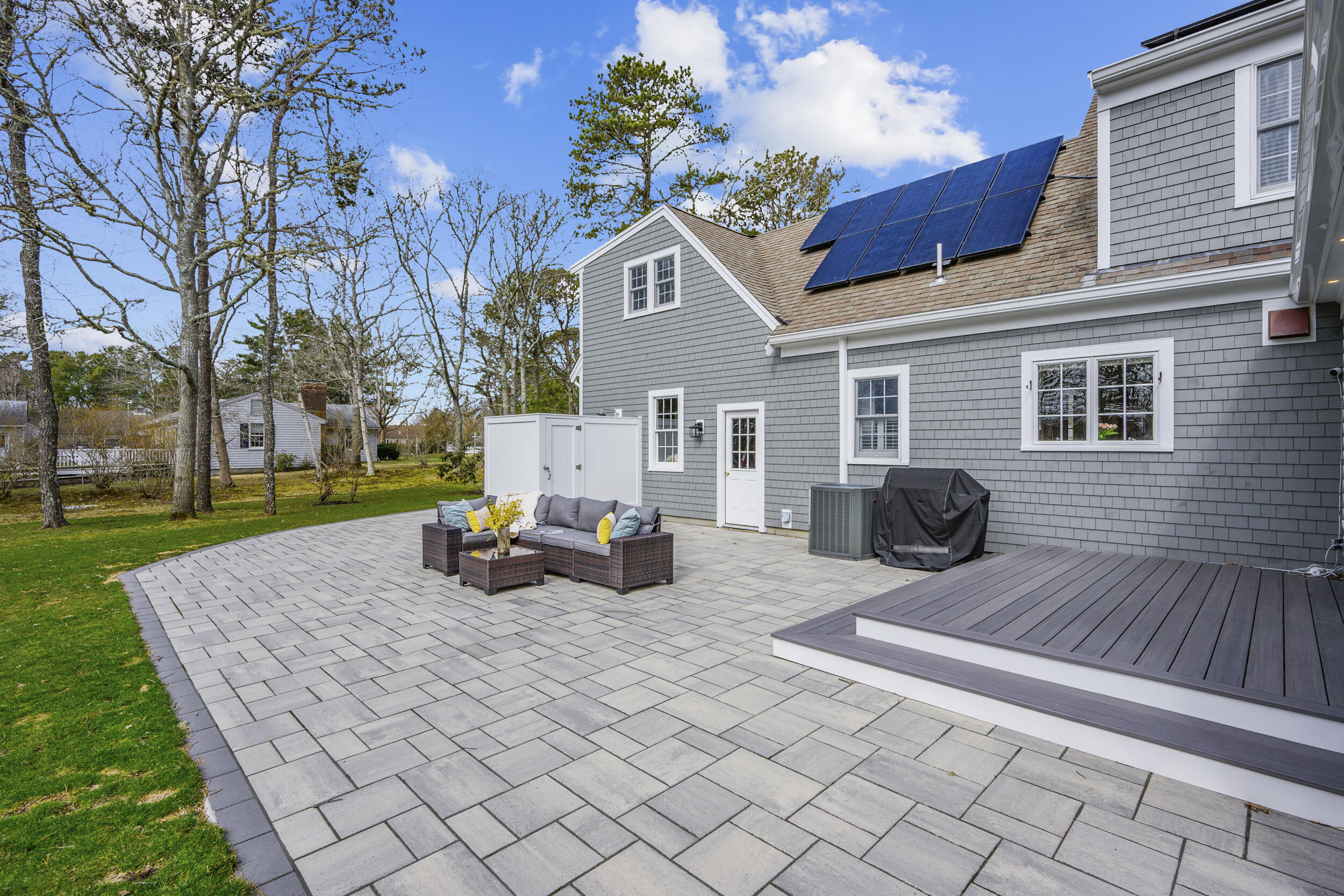 83 Cemetery Road Harwich, MA 02645 - Photo 46 of 53 a view of a house with backyard and sitting area