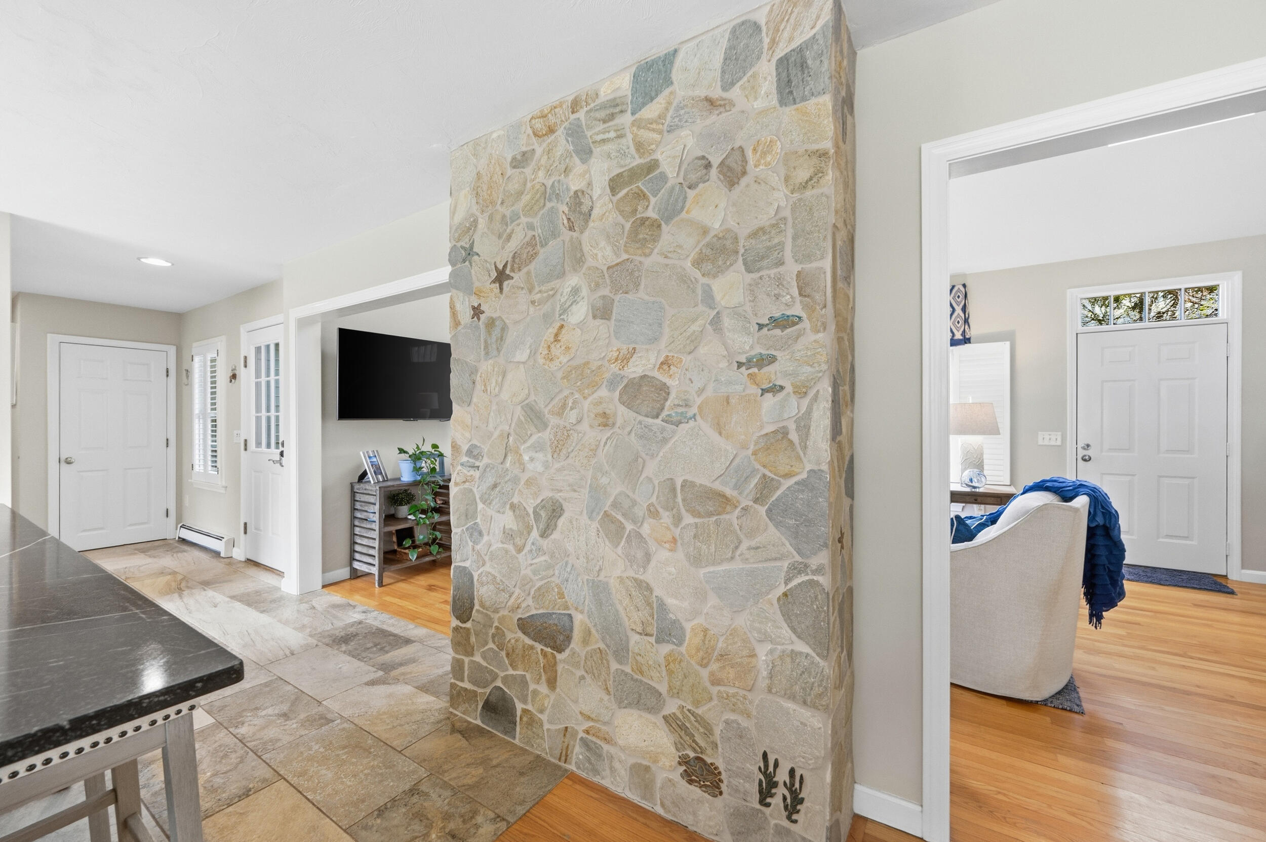 83 Cemetery Road Harwich, MA 02645 - Photo 49 of 53 a living room with furniture and a flat screen tv