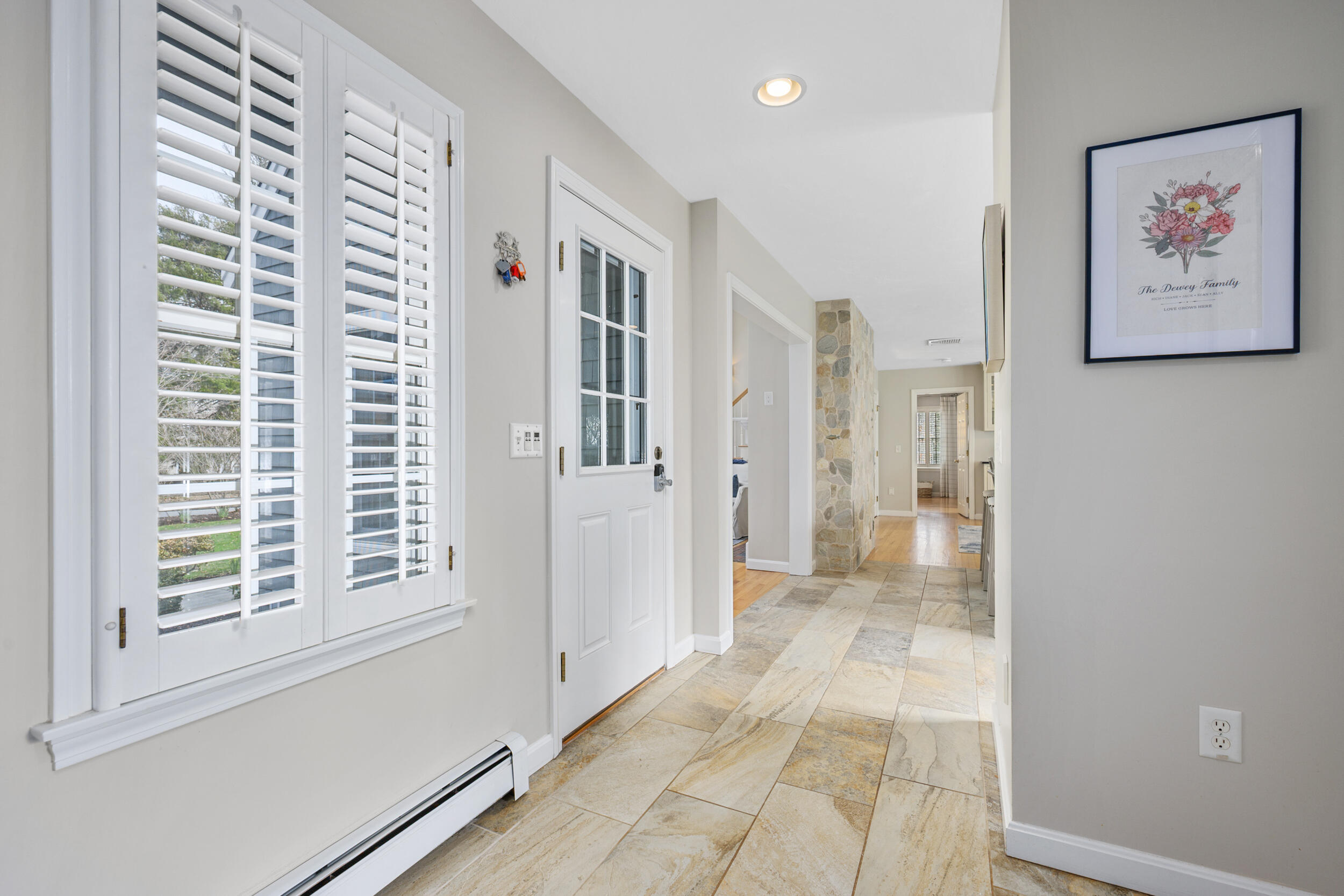 83 Cemetery Road Harwich, MA 02645 - Photo 6 of 53 a view of a hallway with a furniture and entryway