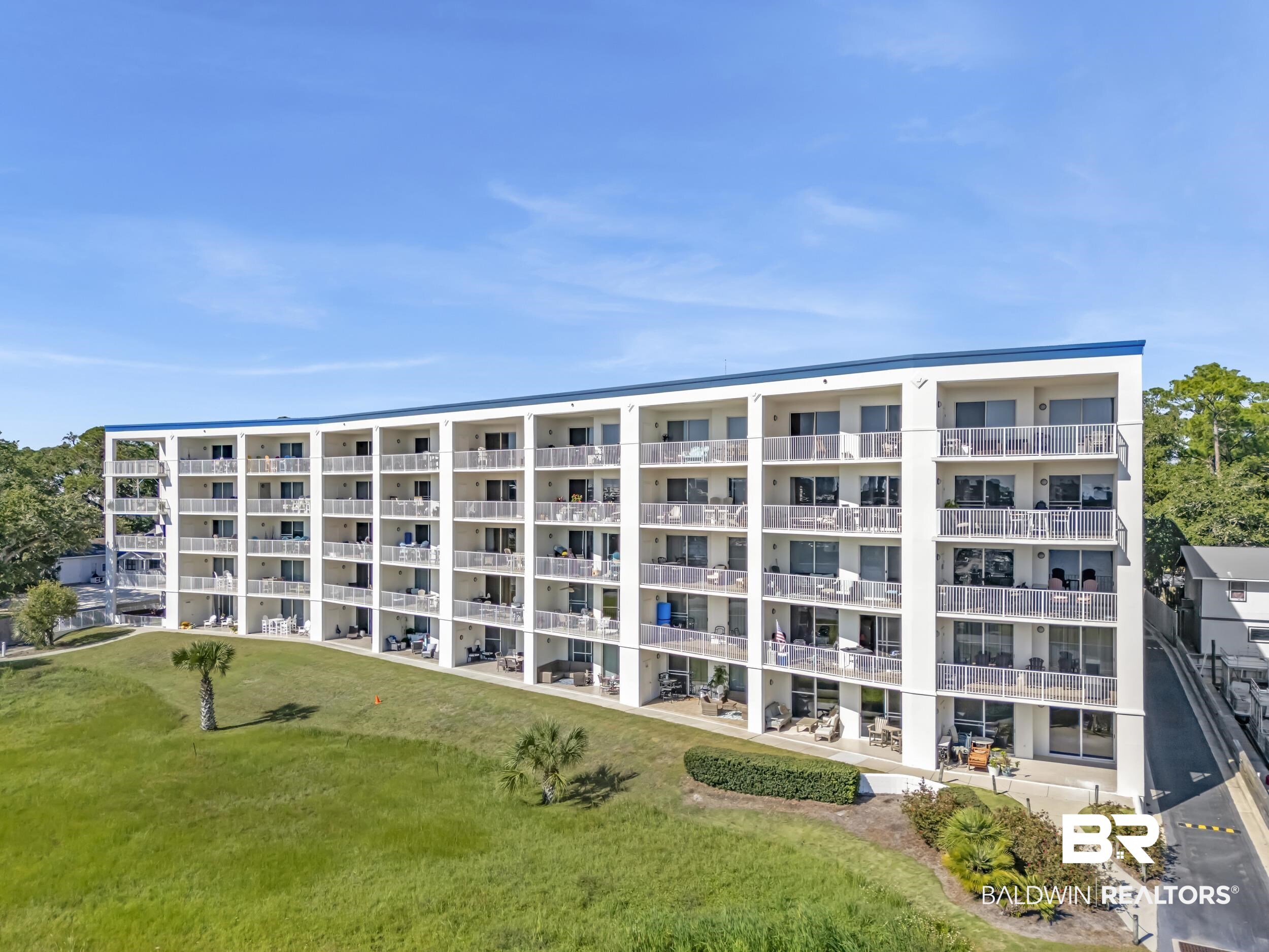 27282 Canal Road, Unit 104 Orange Beach, AL 36561 - Photo 1 of 79 View of apartment building / complex