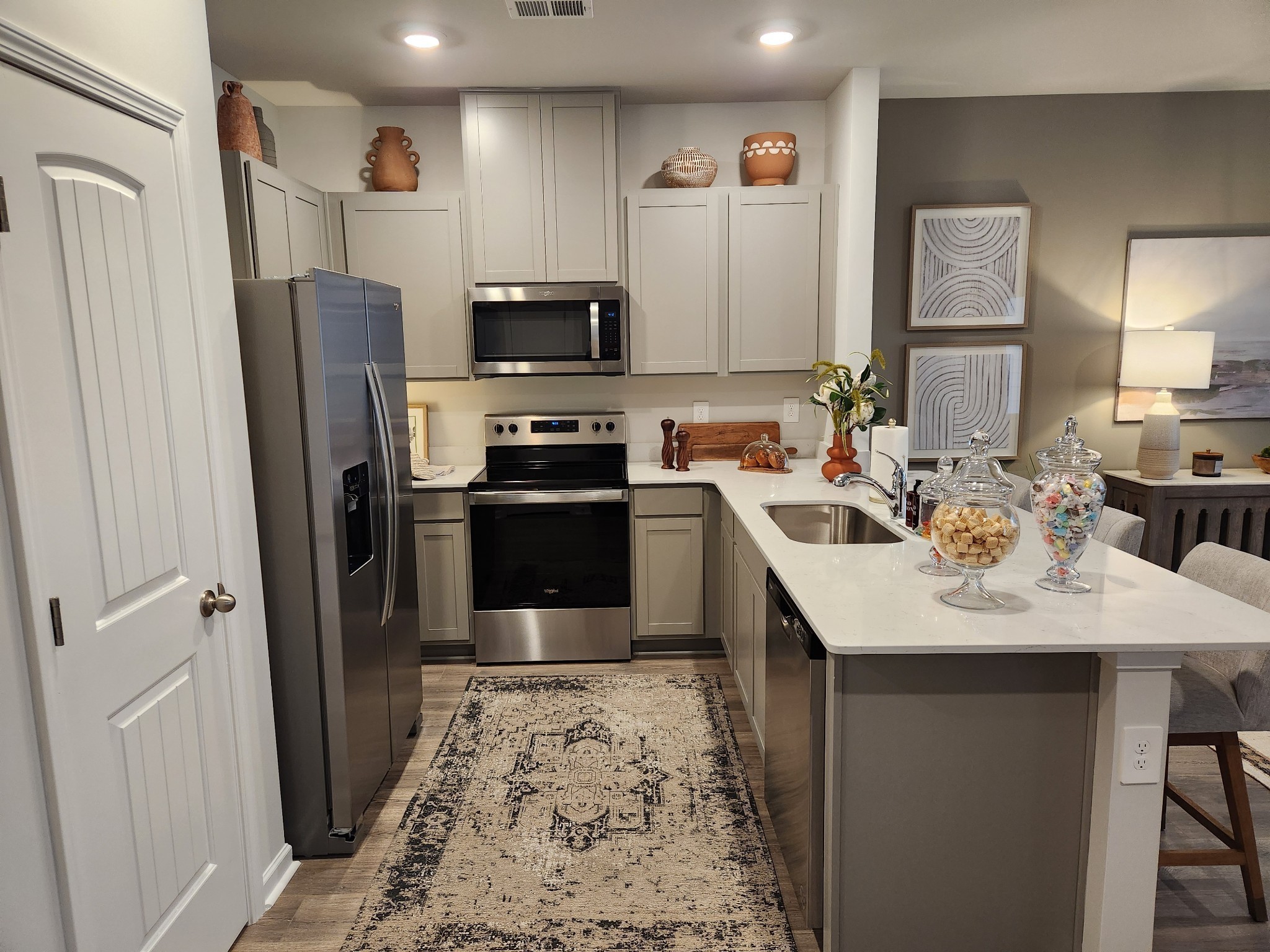 3064 Flyaway Lane Lebanon, TN 37090 - Photo 13 of 29 a kitchen with stainless steel appliances a refrigerator sink and stove