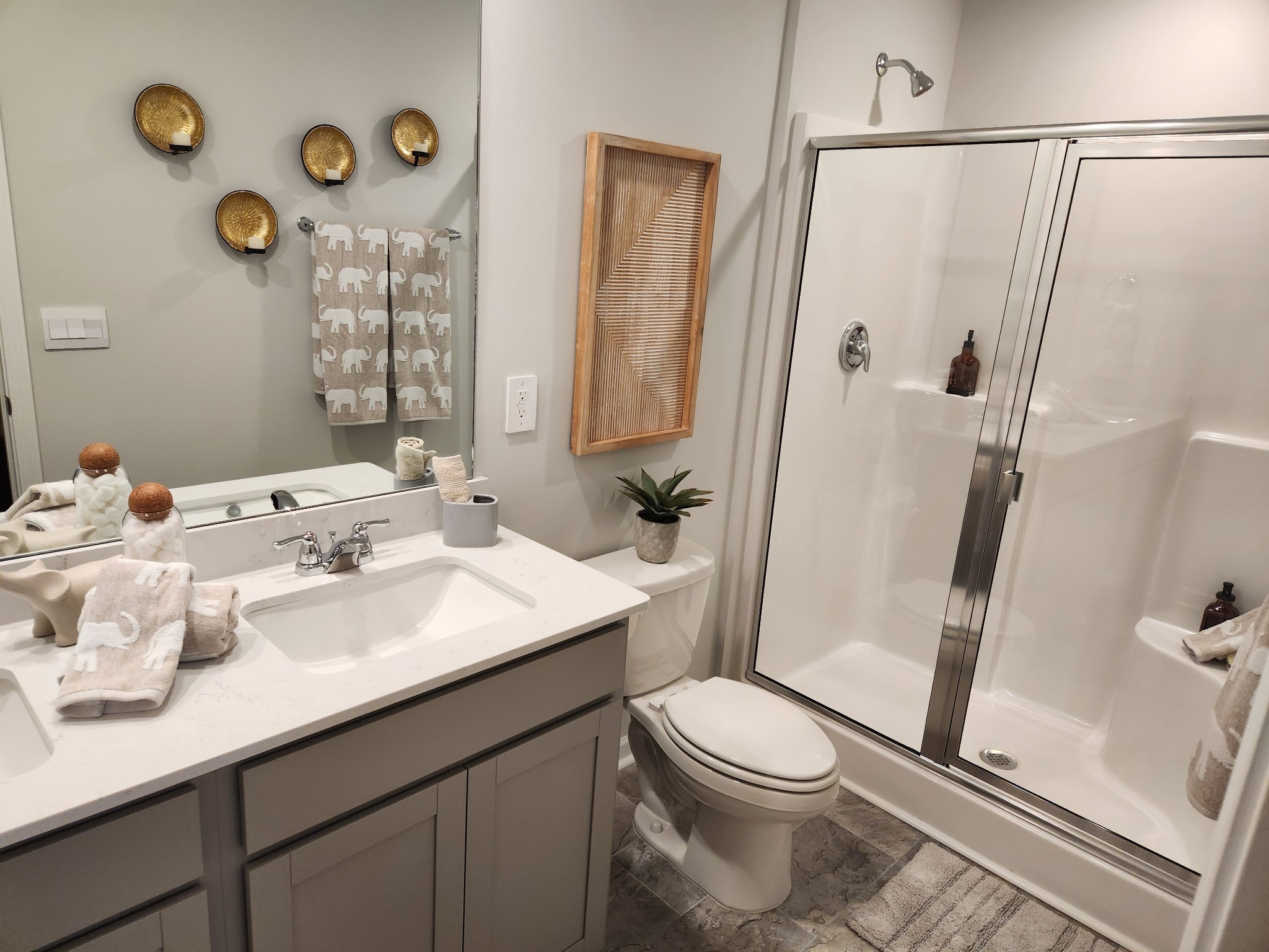 3064 Flyaway Lane Lebanon, TN 37090 - Photo 15 of 29 a bathroom with a sink a toilet a mirror a vanity and shower