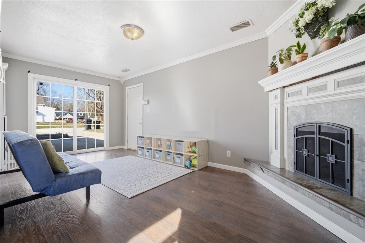 206 North Grove Street Normal, IL 61761 - Photo 11 of 24 a living room with furniture and a fireplace