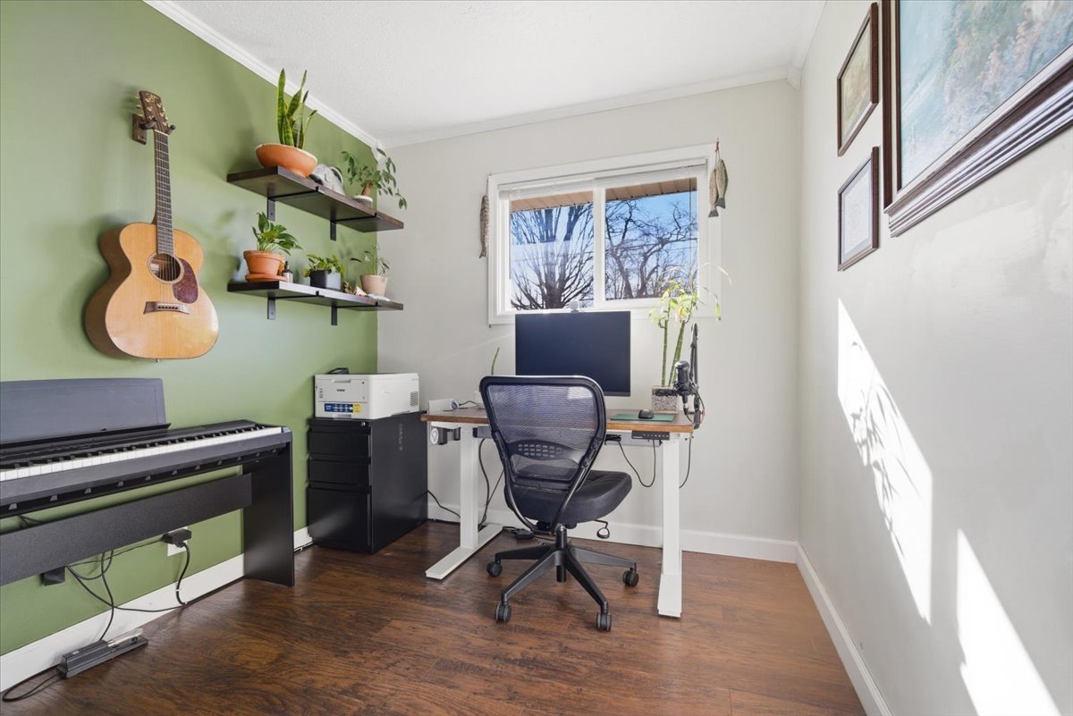 206 North Grove Street Normal, IL 61761 - Photo 15 of 24 a work room with furniture and wooden floor
