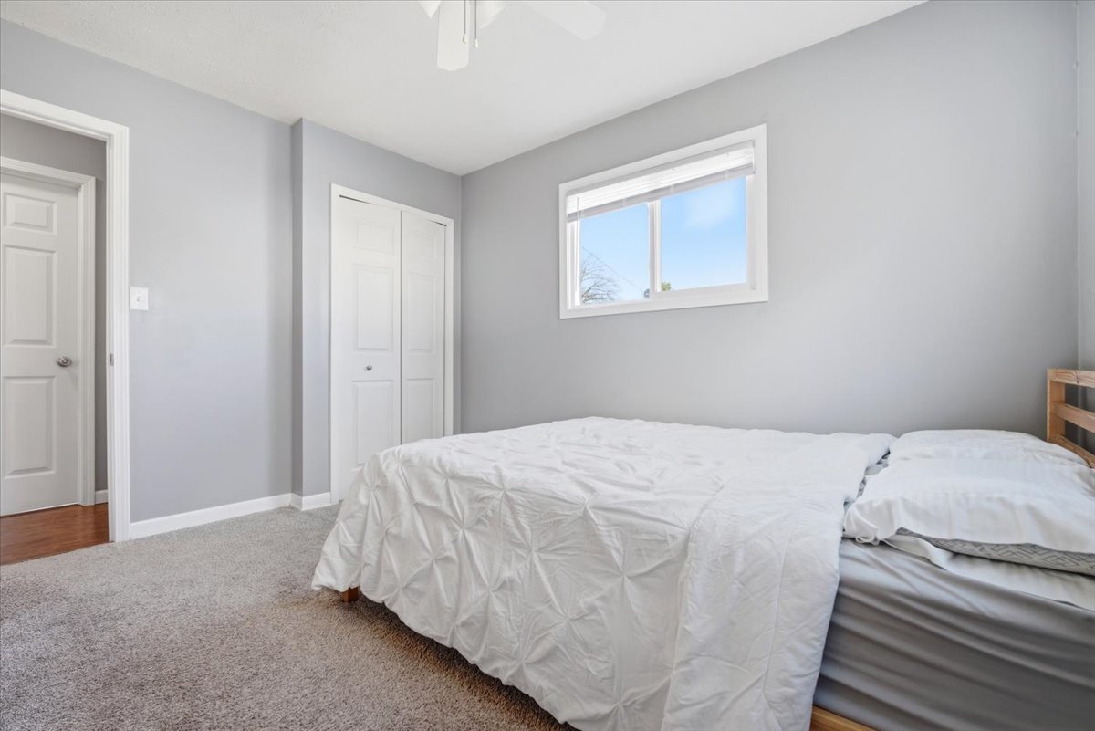 206 North Grove Street Normal, IL 61761 - Photo 17 of 24 a bedroom with a bed and a window