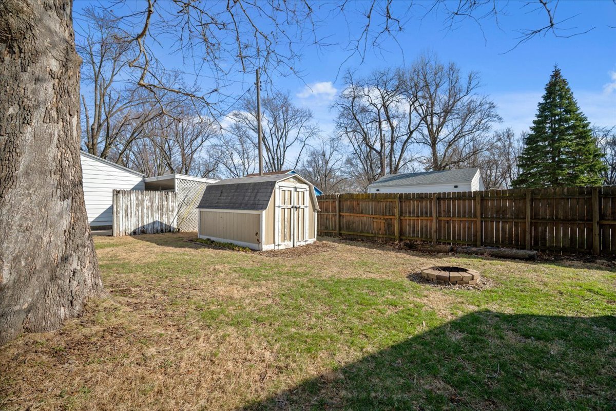 206 North Grove Street Normal, IL 61761 - Photo 22 of 24 a backyard of a house with lots of green space