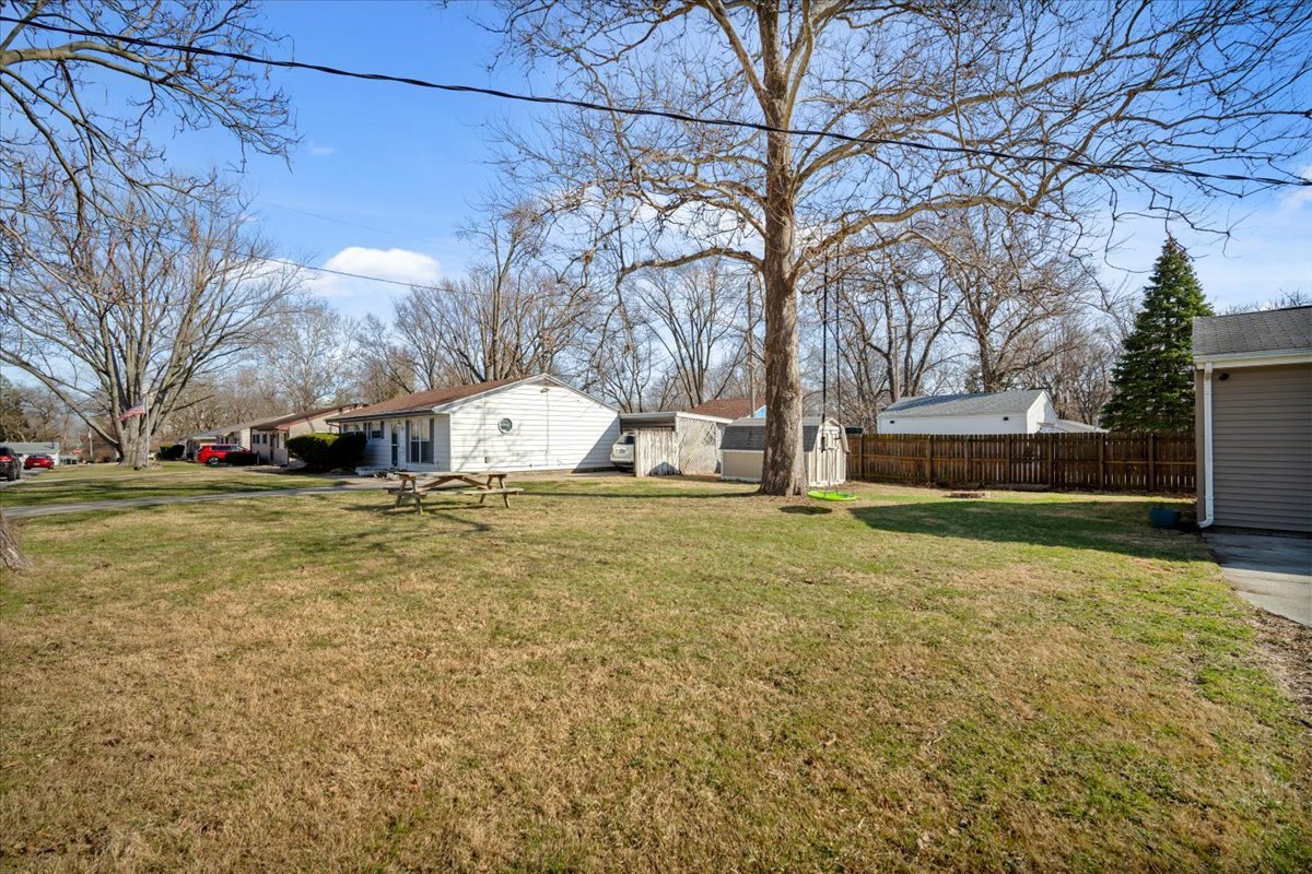206 North Grove Street Normal, IL 61761 - Photo 23 of 24 a view of a yard with a house and a tree