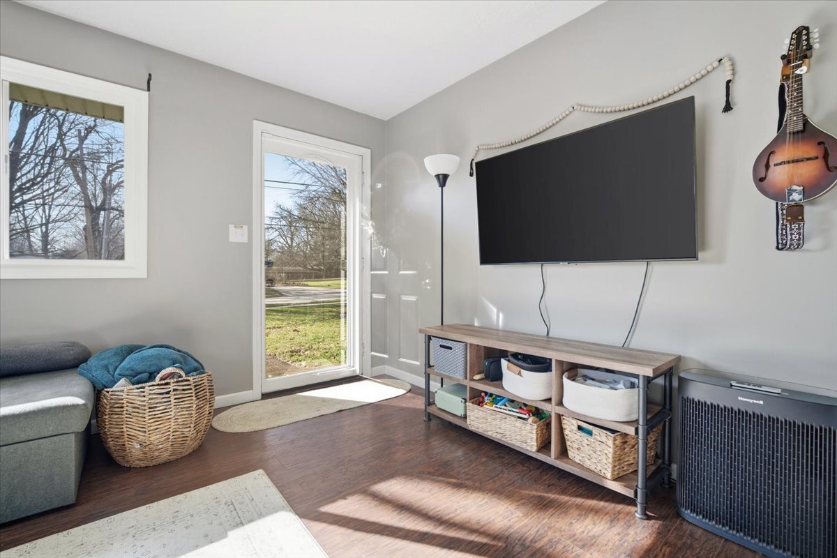 206 North Grove Street Normal, IL 61761 - Photo 4 of 24 a living room with furniture and a flat screen tv