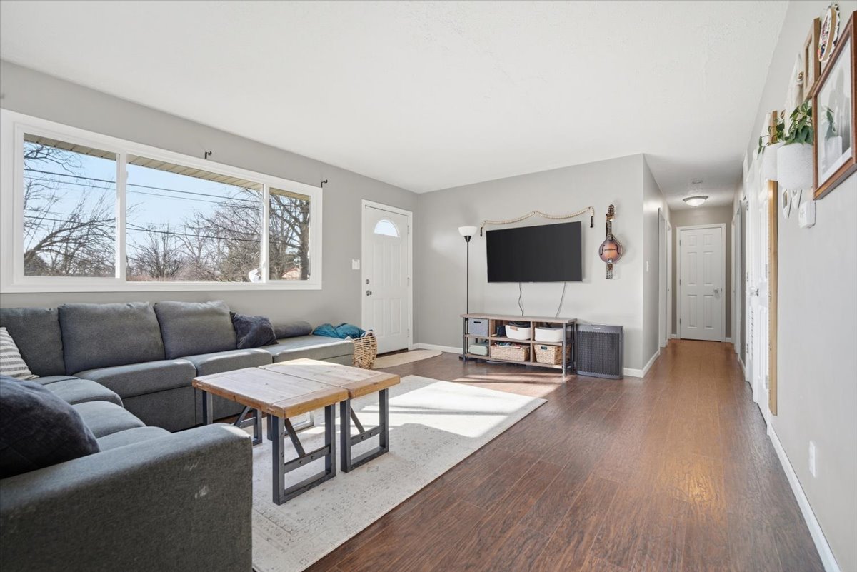 206 North Grove Street Normal, IL 61761 - Photo 7 of 24 a living room with furniture and a flat screen tv