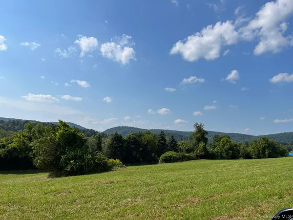 a view of a big yard with green space