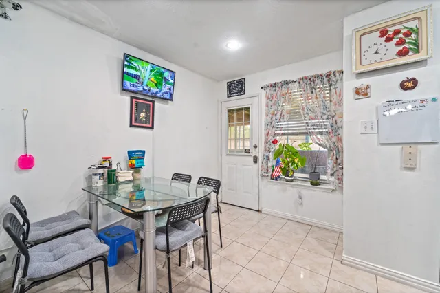 a view of a workspace with furniture