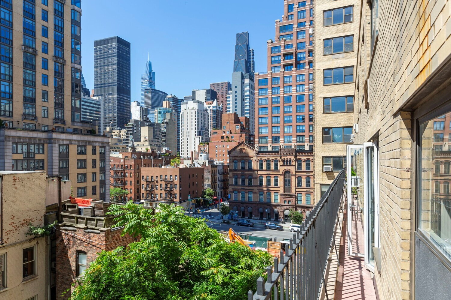 400 East 52nd Street, Unit 7J Manhattan, NY 10022 - Photo 8 of 9 a city view with tall buildings