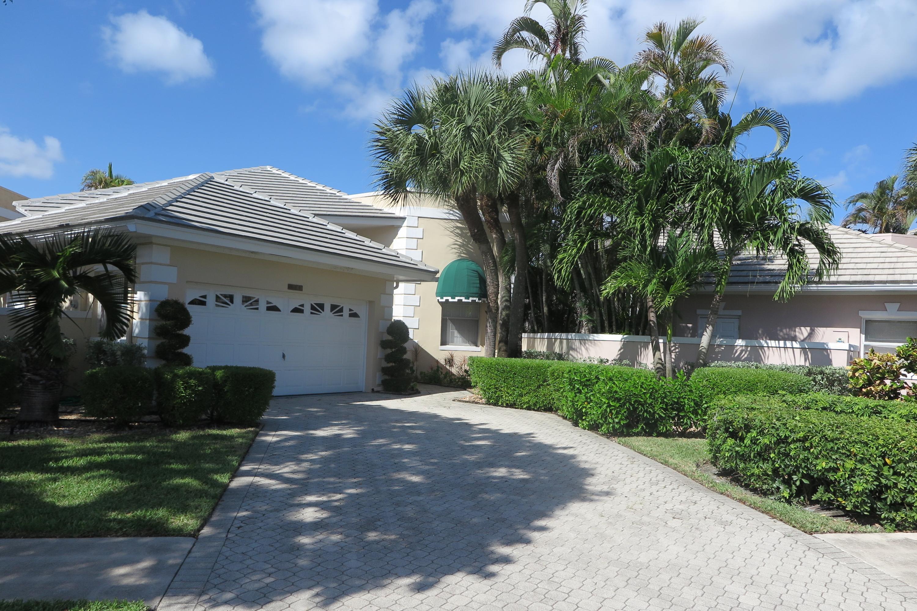 7765 Travelers Tree Drive Boca Raton, FL 33433 - Photo 1 of 18 FRONT