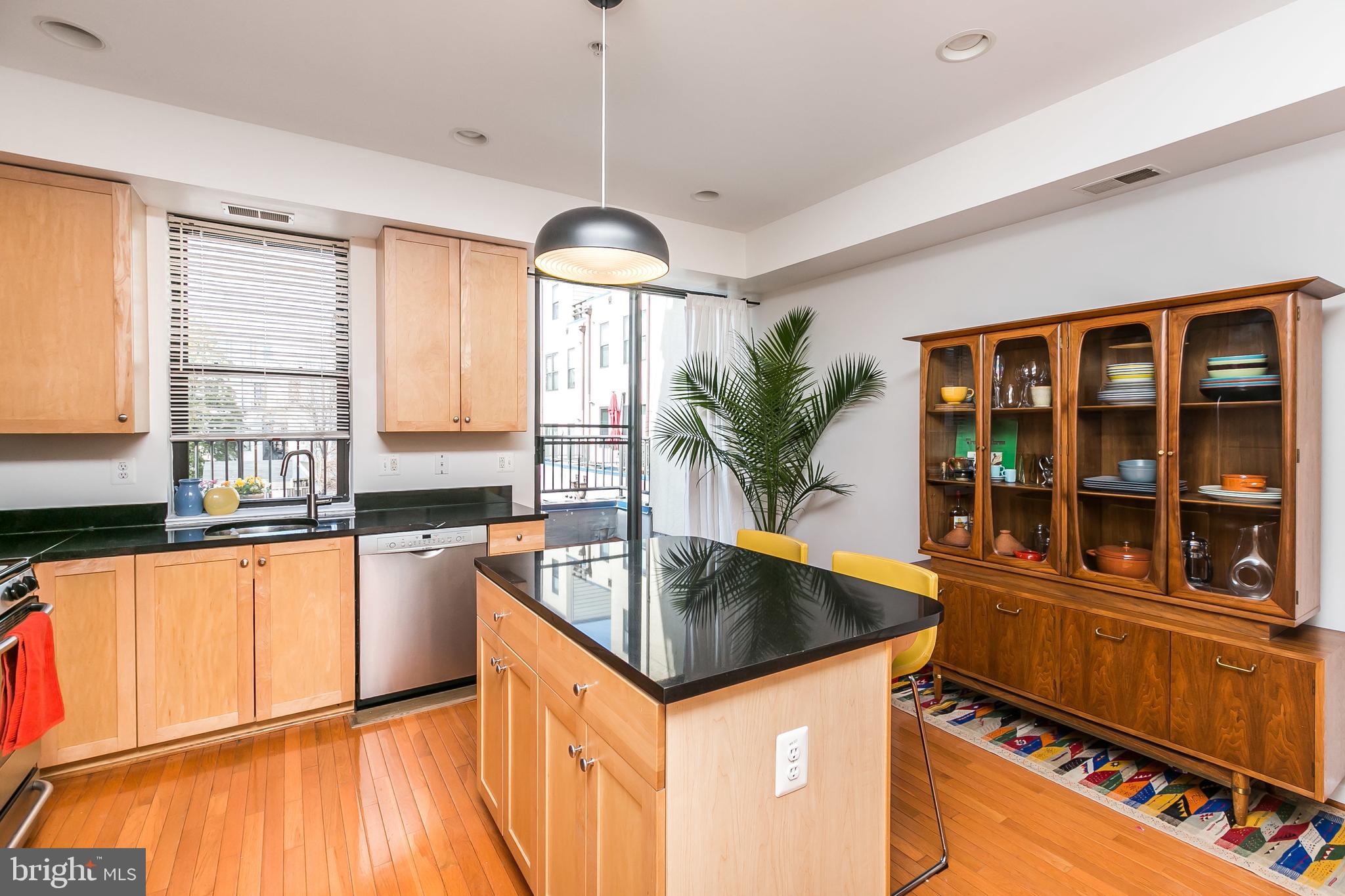 1708 North Calvert Street Baltimore, MD 21202 - Photo 14 of 45 Kitchen with view to outdoor terrace