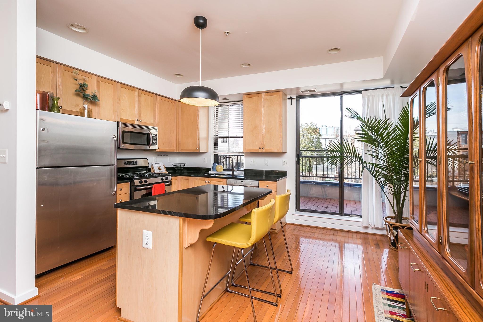 1708 North Calvert Street Baltimore, MD 21202 - Photo 15 of 45 Kitchen with view to outdoor terrace