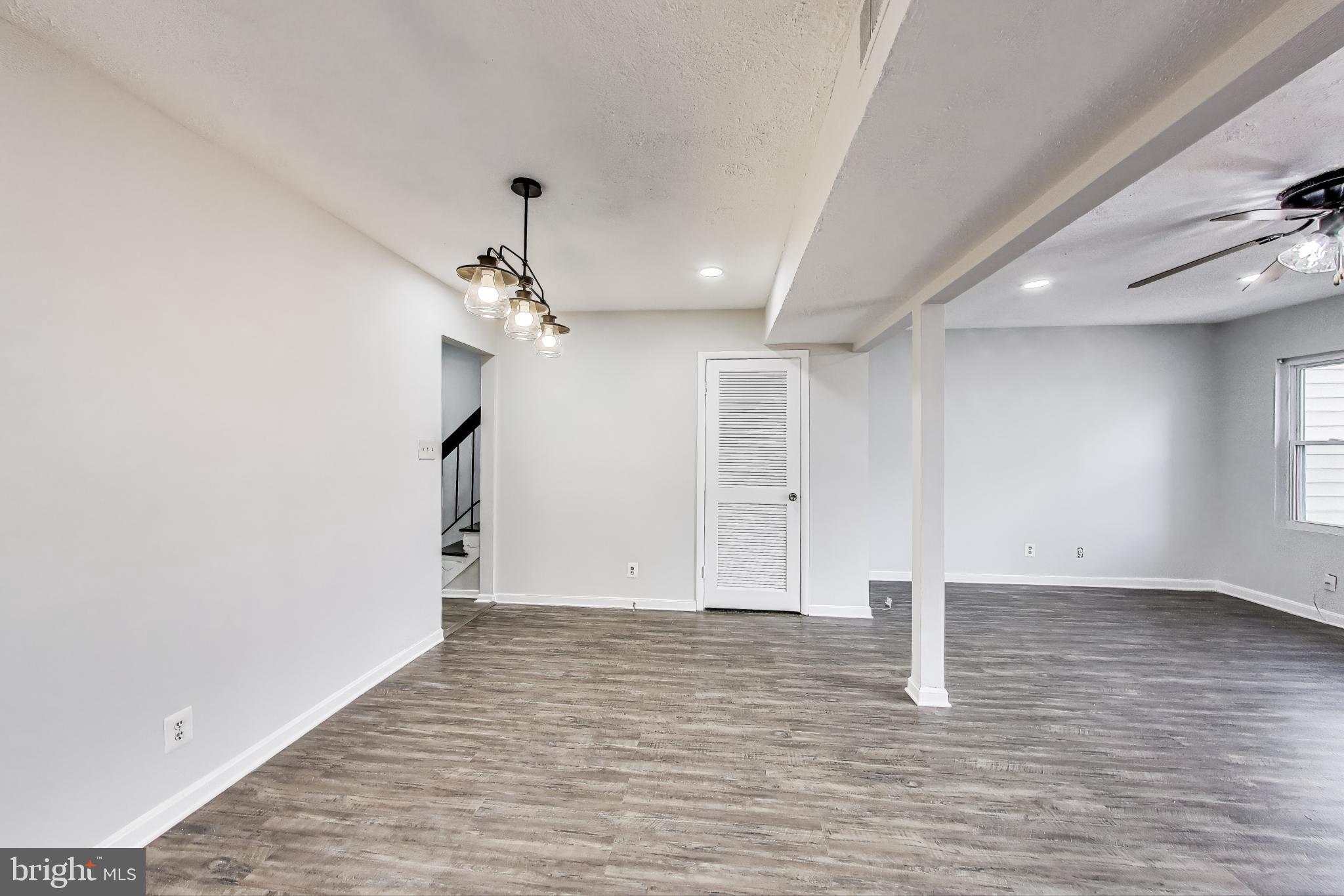 17520 Hoskinson Road Poolesville, MD 20837 - Photo 9 of 31 a view of empty room with wooden floor