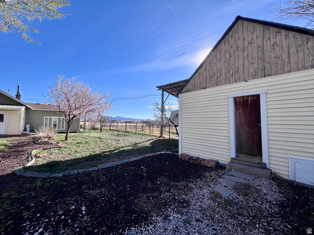 479 East 100 N Road Meadow, UT 84644 - Photo 38 of 59 View of yard featuring entry steps