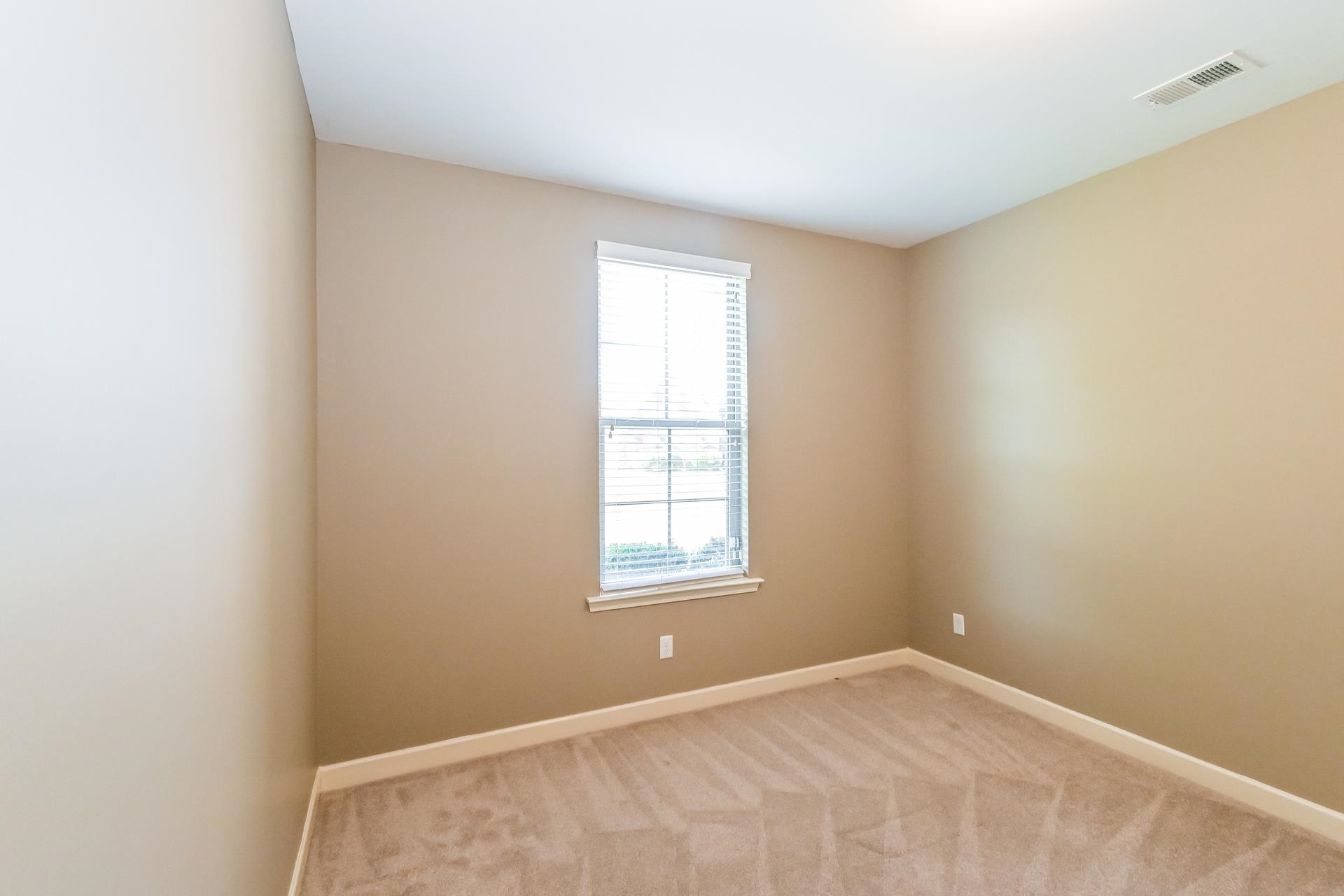 7530 Bevy Ridge Lane Memphis, TN 38125 - Photo 17 of 22 View of carpeted empty room
