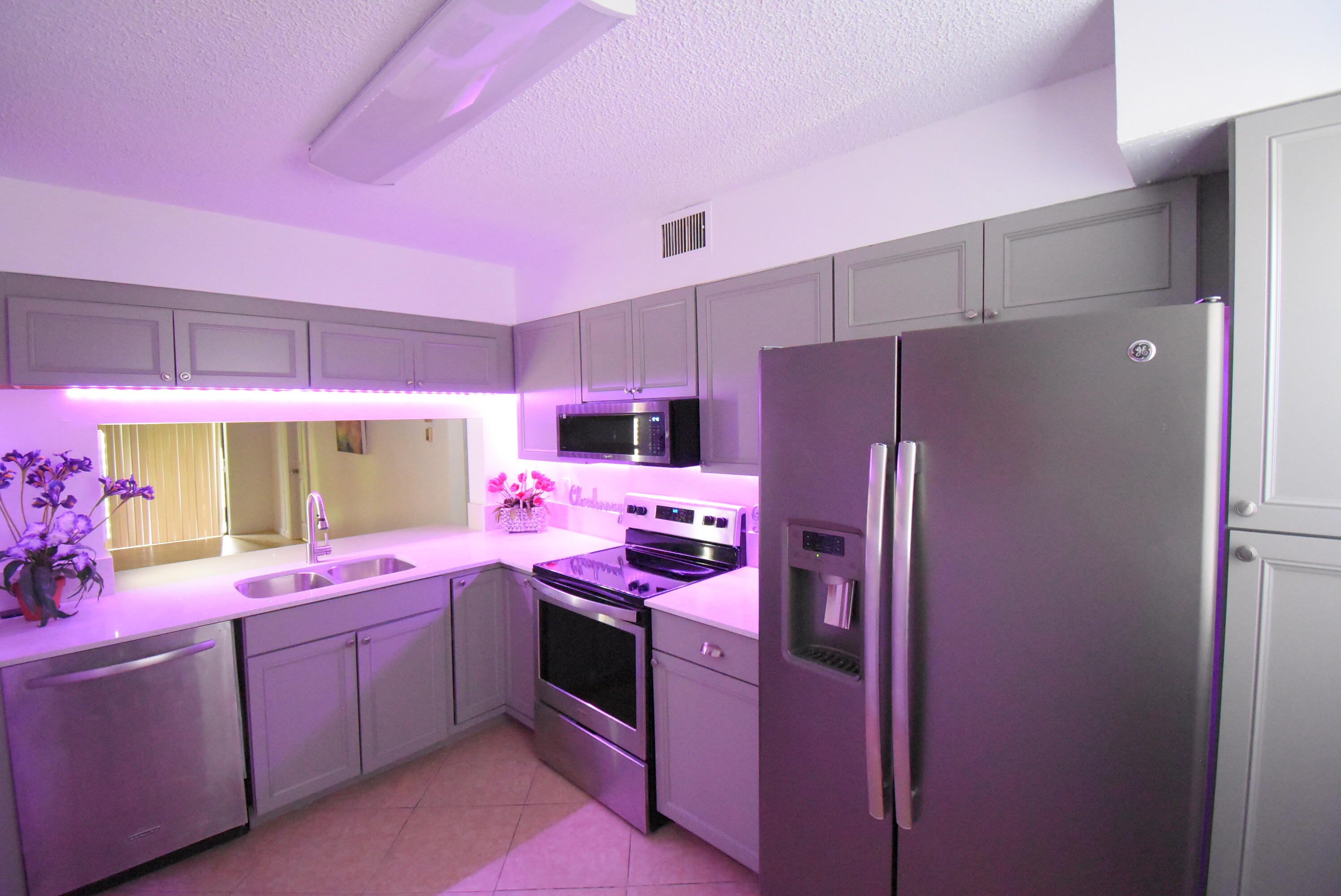 3375 Jaywood Terrace, Unit J103 Boca Raton, FL 33431 - Photo 2 of 32 KITCHEN