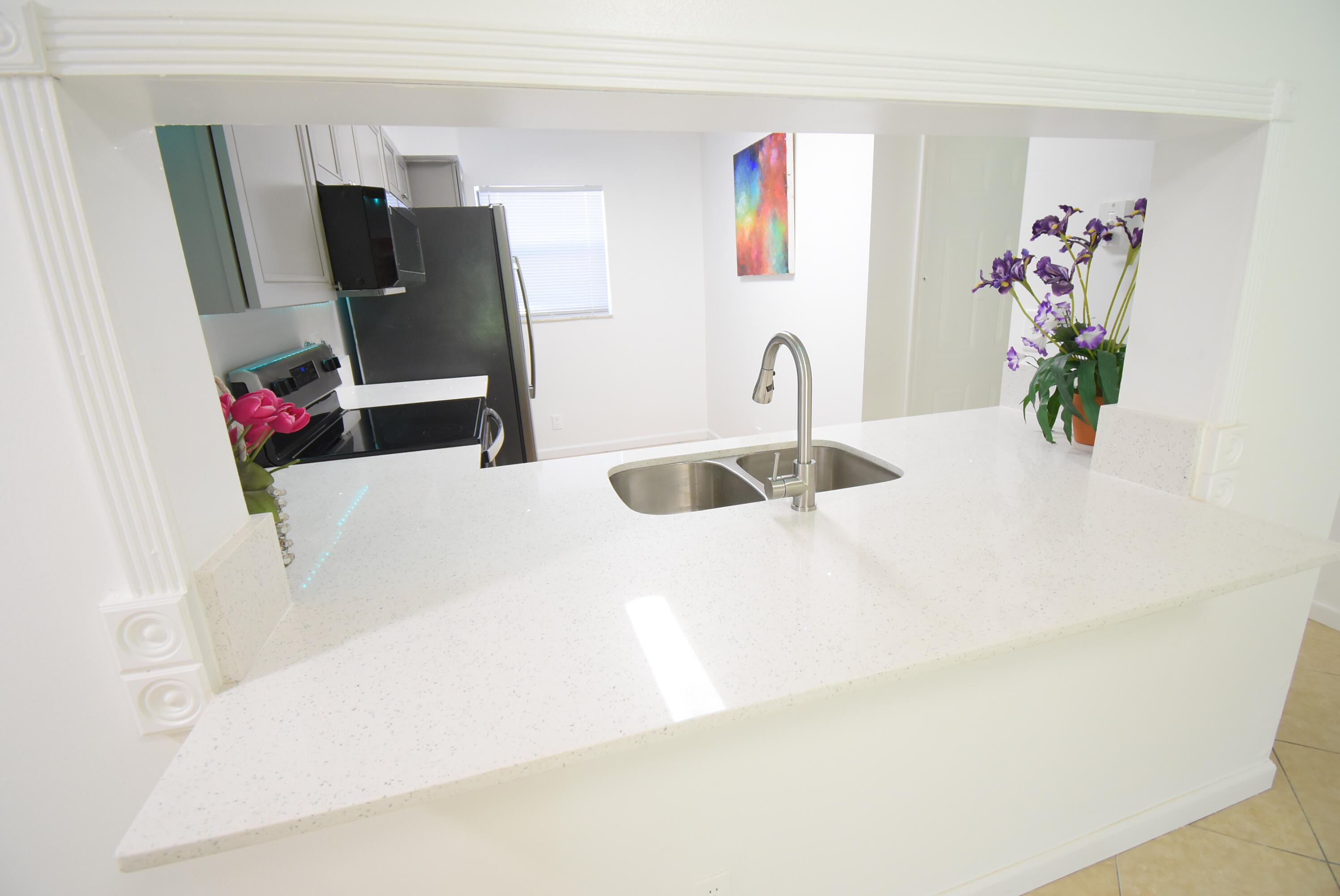 3375 Jaywood Terrace, Unit J103 Boca Raton, FL 33431 - Photo 23 of 32 KITCHEN