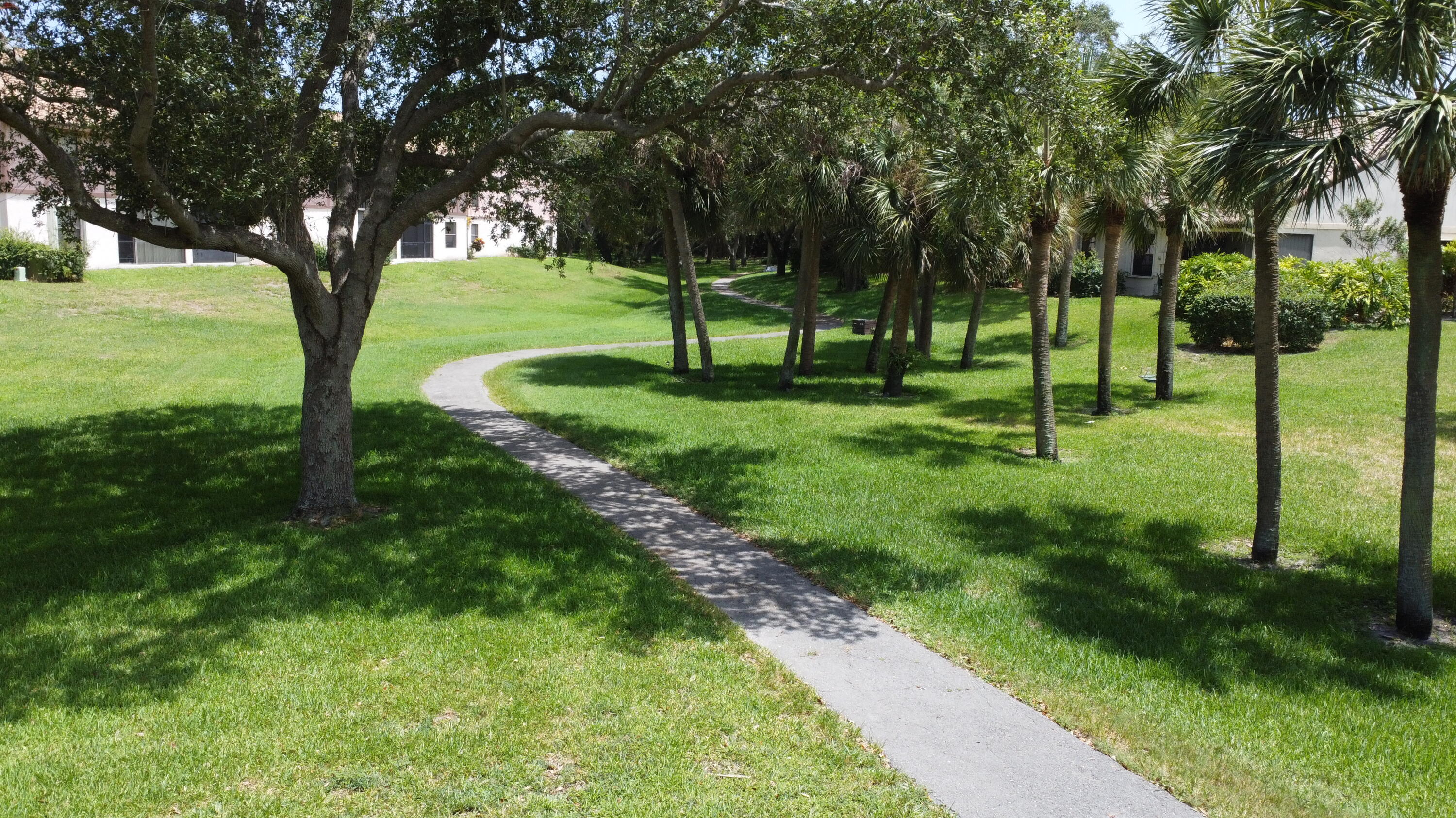 3375 Jaywood Terrace, Unit J103 Boca Raton, FL 33431 - Photo 26 of 32 WALKWAY OUTBACK