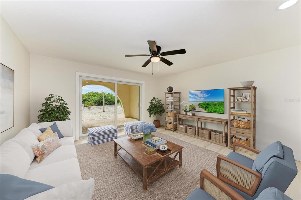 101 73rd Street, Unit 2 Holmes Beach, FL 34217 - Photo 17 of 55 a living room with furniture