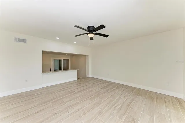 a view of kitchen island wooden floor