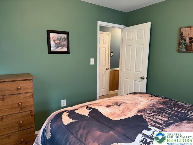 192 Cartwright Road Blakeslee, PA 18610 - Photo 16 of 20 a bedroom with a bed and a window