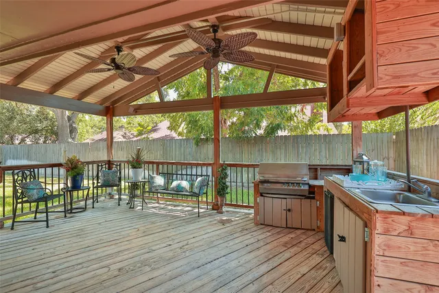 a view of outdoor space with wooden floor